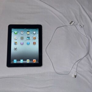 Apple Tablet with Black Bezel and Silver Back